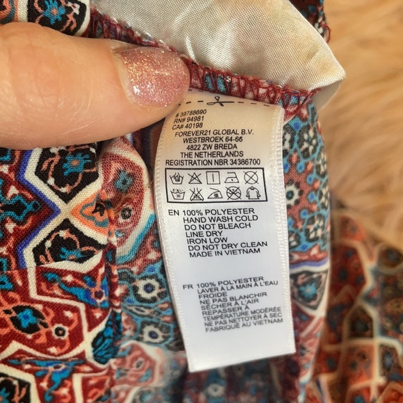 Red and blue patterned pants not sure the brand or size fits x small or small - Picture 5 of 5